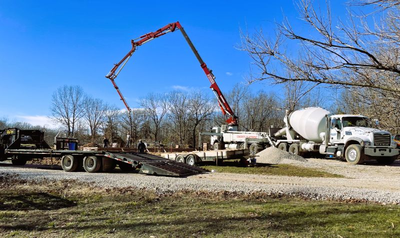 A concrete pump truck used to construct the foundation on a custom home builder project near Springfield MO